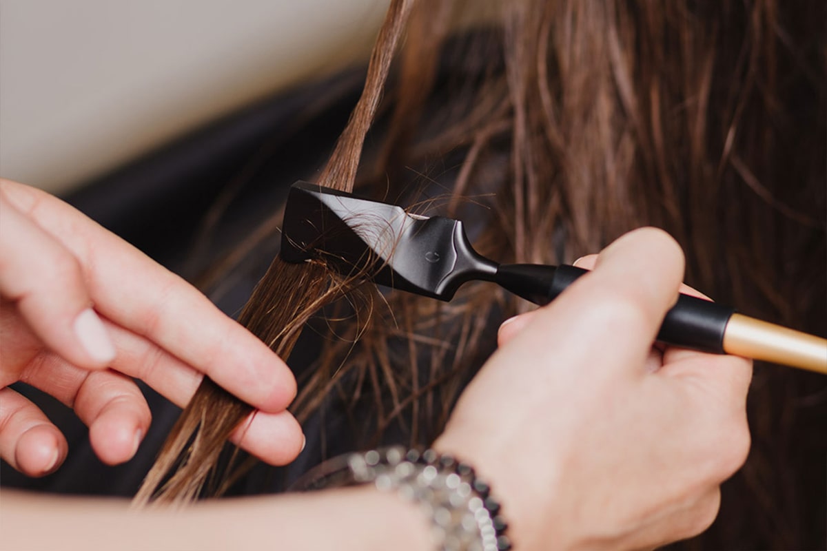 rottmann-ruether_friseur-muenster_artikel-calligraphy-cut-braune-haare